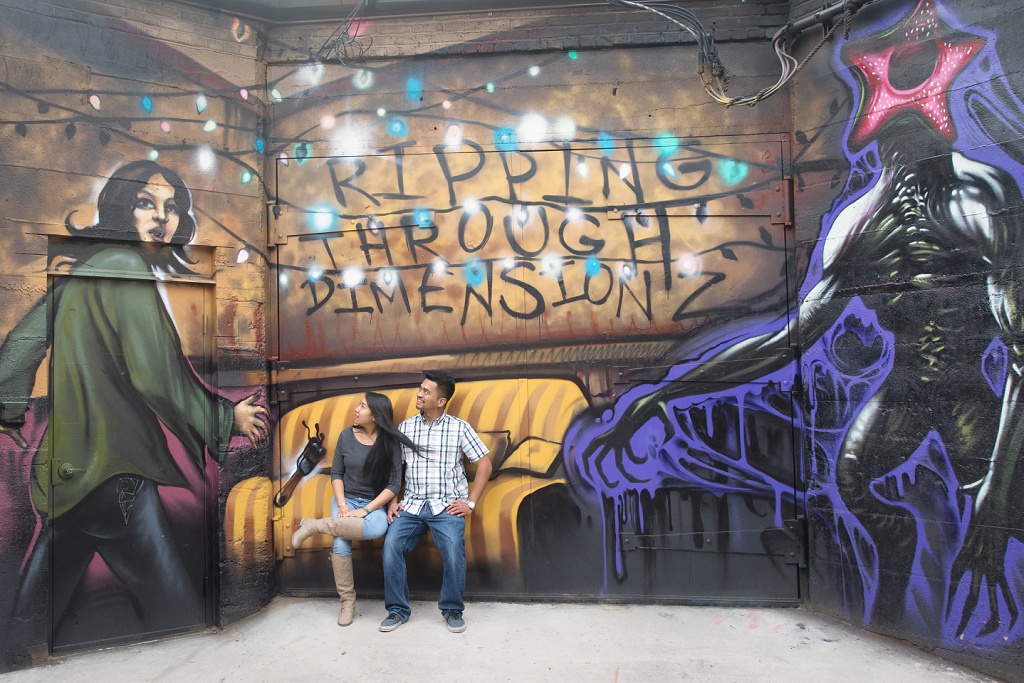 Denver street art engagement session with Stranger Things mural