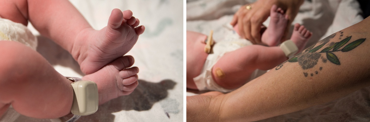 Newborn feet with security device on ankle, baby footprint tattoo 