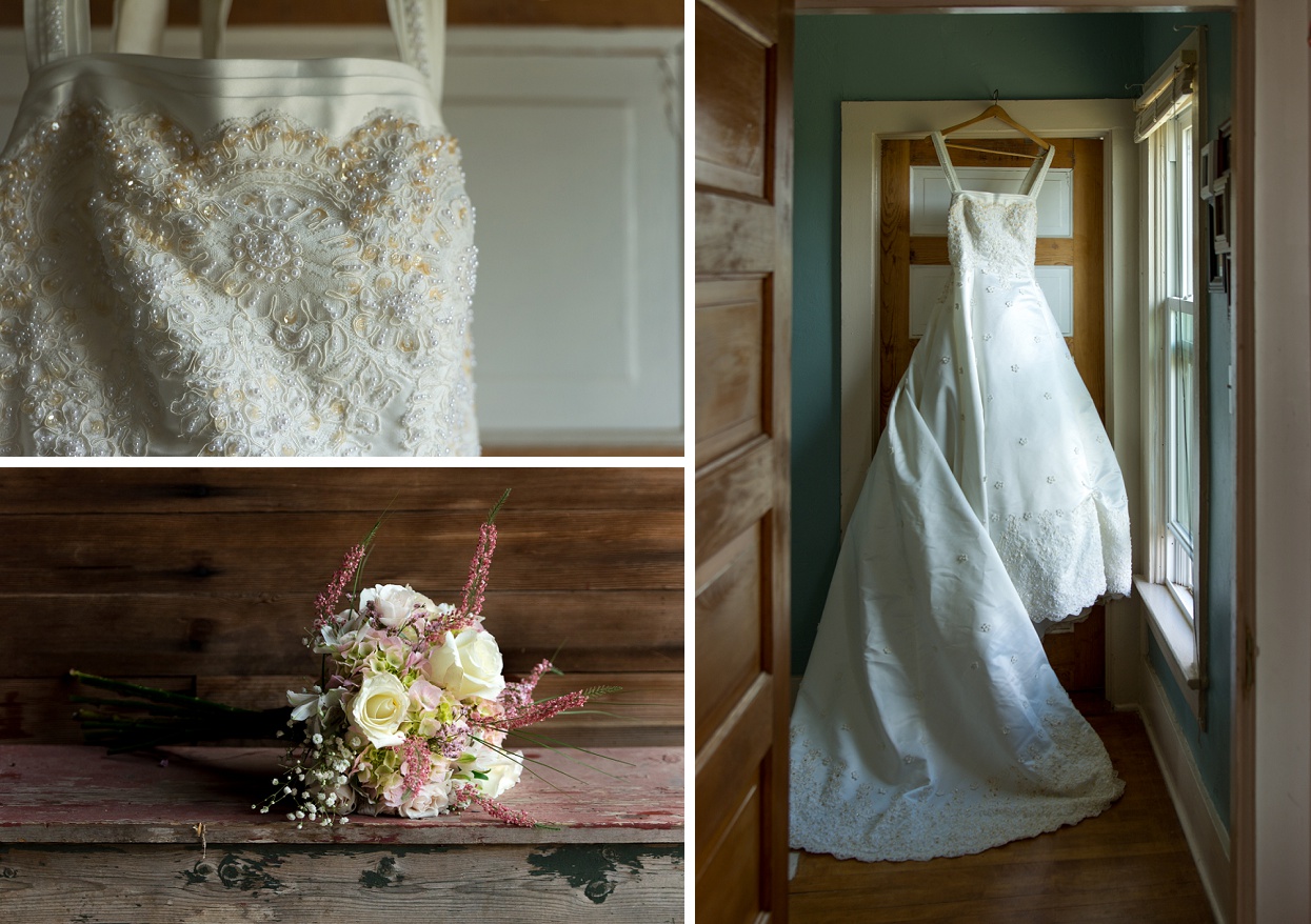 Low key lighting of bride's dress hanging from a door frame, dramatic lighting of bouquet