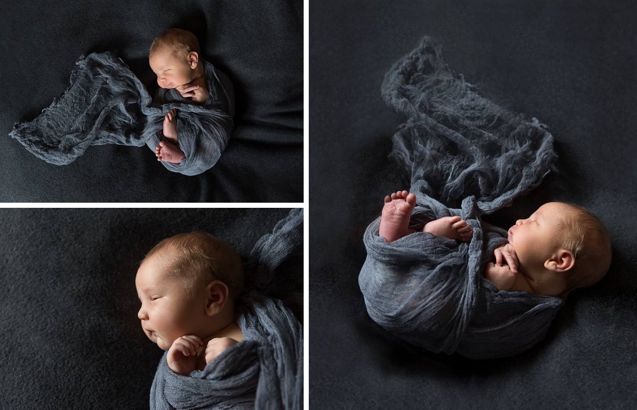 Newborn swaddled in grey on a grey blanket