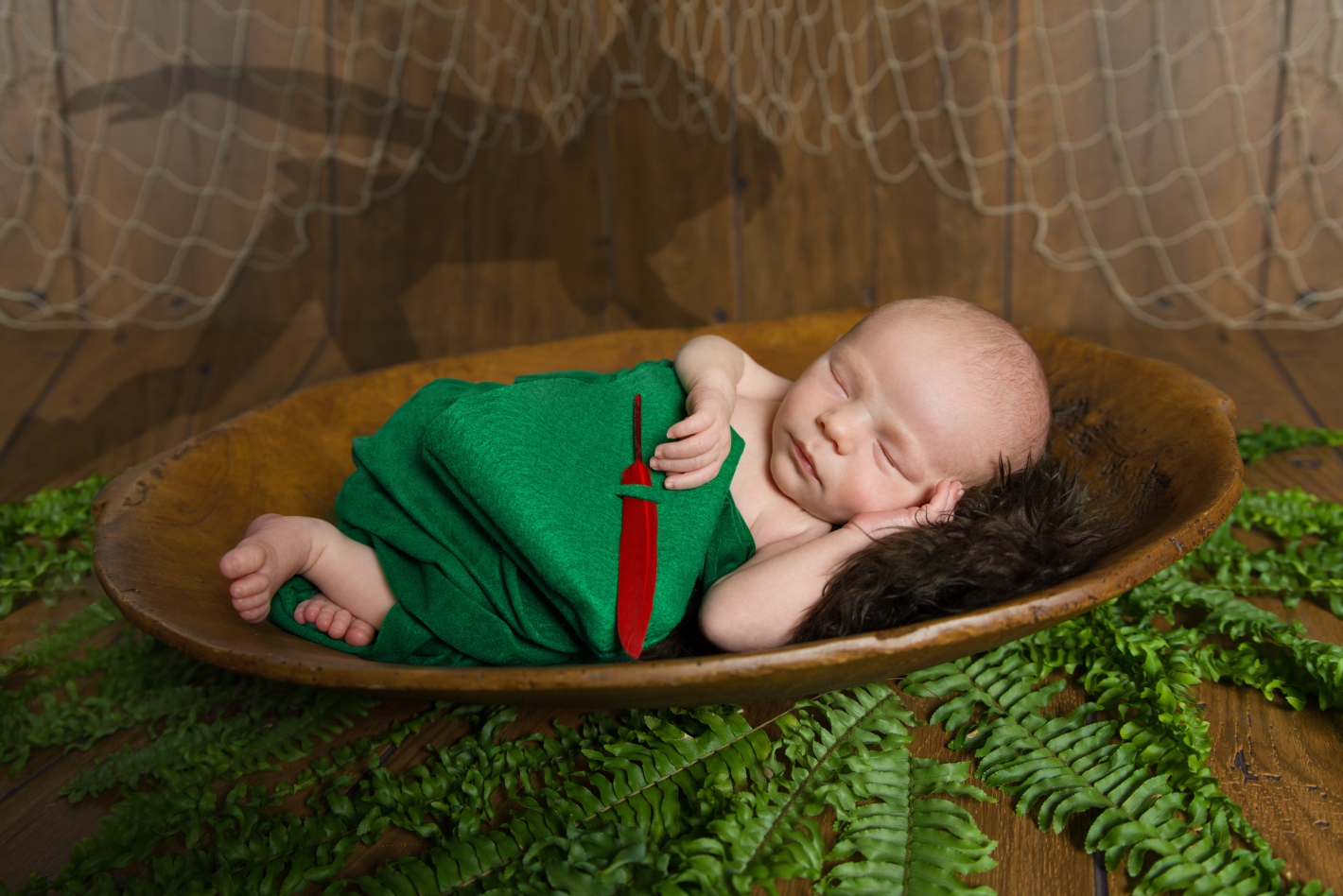 Peter Pan newborn photos with shadow in background