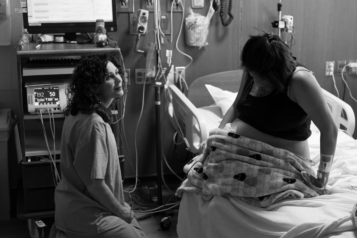 Denver Health Birth Photography, nurse with patient