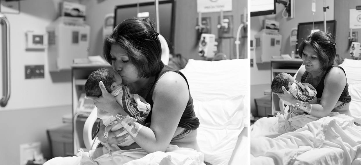 Mother smiling at her new baby after childbirth at Denver Health