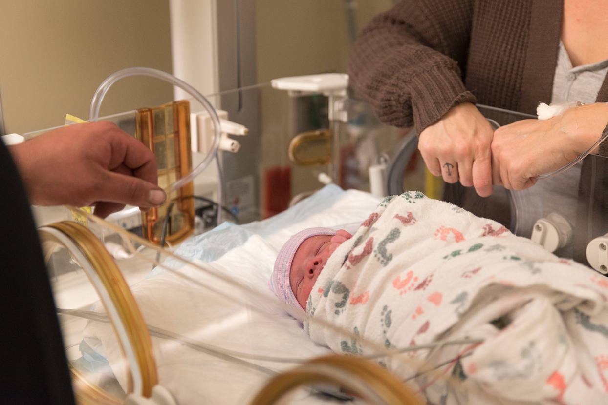 Baby in NICU, incubator birth photos